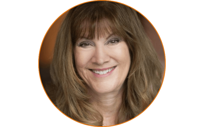 A person with long brown hair smiling, framed within a circular border, embodies the warmth and friendliness you'd find at our Weekly Career Help sessions.